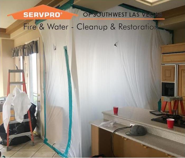 A residential setup to contain a moldy area where remediation is going to happen.